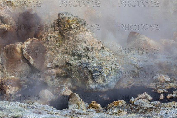 Solfatara field with hot pools and boiling mud at Seltun, Reykjanes nature reserve
