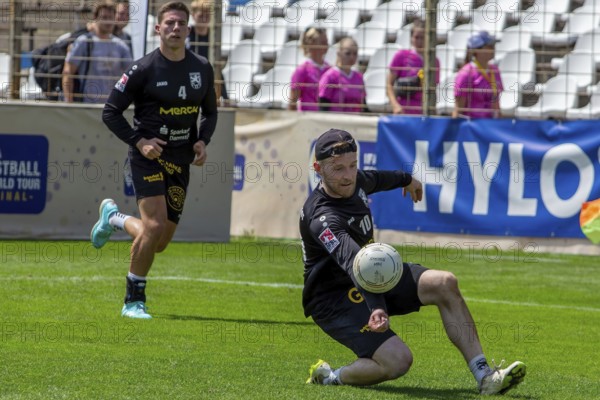 Fistball: TSV Pfungstadt against DSG UKJ Froschberg (IFA 2024 Fistball World Tour Finals Mannheim, preliminary round match Group A) . Picture: Sebastian Thomas (10, Pfungstadt)