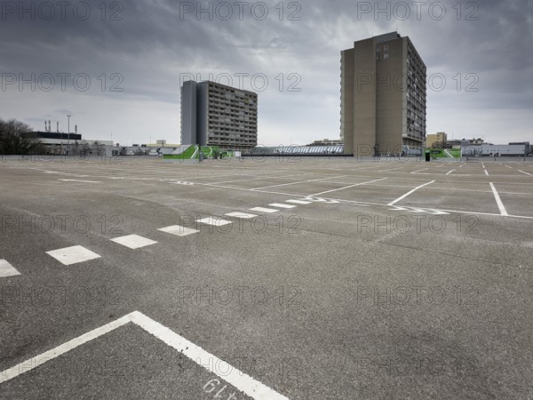 Symbolic image economic crisis, dark clouds in the sky, empty parking deck at Olympia-Einkaufszentrum OEZ, Pelkovenstraße, Munich, Bavaria, Germany, Europe