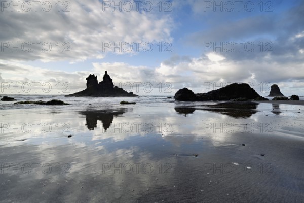 Dramatic clouds with rock formation on the beach of Playa de Benijo, Tenerife, Canary Island, Spain, Europe
