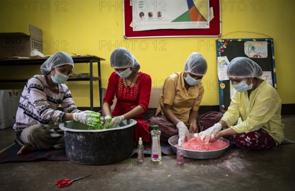 Students of Ashaneer Home makes organic coloured powder ahead of Holi Festival, in Guwahati, India on, 12 March 2025. Ashaneer Home for Special Need Children is a dedicated initiative under the Assam Child and Women's Welfare Society (ACWWS). It serves as a safe and nurturing home for children with special needs, providing care, education, therapy, and rehabilitation