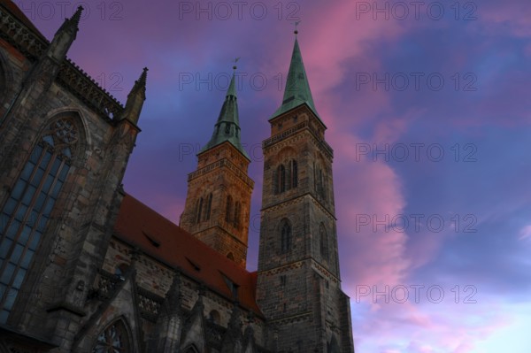 Towers of St Sebald's Church in the evening light, Nuremberg, Middle Franconia, Bavaria, Germany, Europe