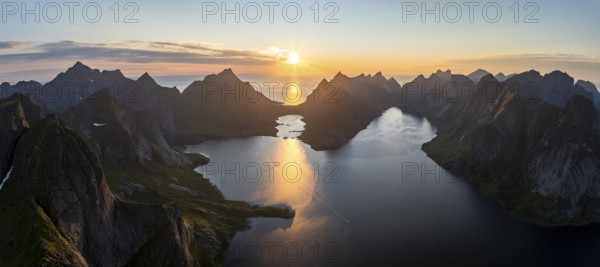 View of mountains in Reinefjord, midnight sun, Reine, Lofoten, Norway, Europe