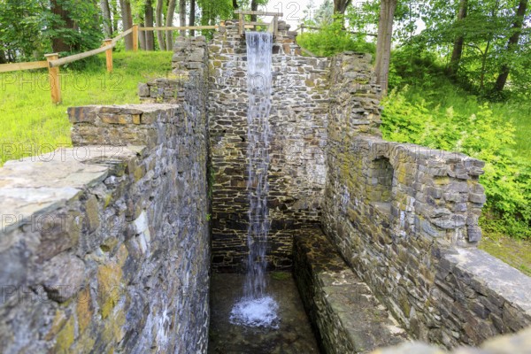 Ruins of the Sendig mill with wheel chamber and waterfall, oldest paper mill, Zwönitz, Erzgebirge, Saxony, Germany, Europe