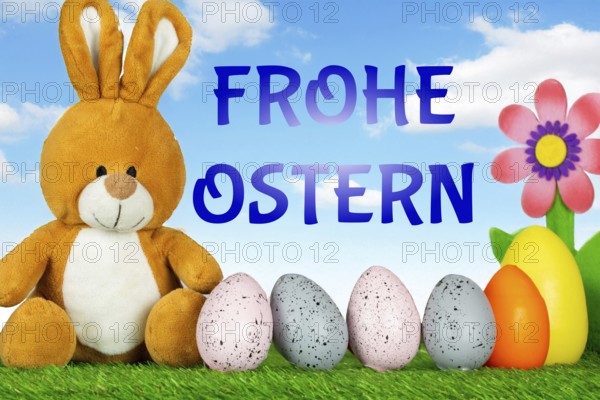 Easter greetings: Easter bunny with colourful Easter eggs with text FROHE OSTERN (Composing)
