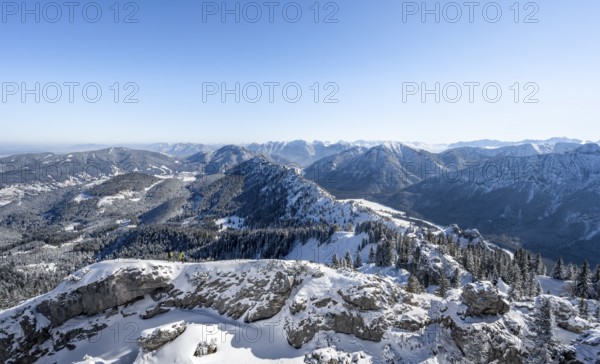 Snow-covered mountain landscape, view of forest and mountain panorama at Teufelstättkopf, Ammergau Alps, Bavaria, Germany, Europe