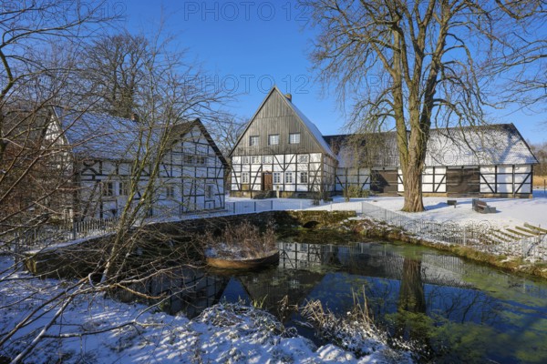 Holzwickede, Ruhr area, North Rhine-Westphalia, Germany, Winter with snow in the Ruhr area, Emscher spring, the river Emscher rises at the Emscherquellhof in Holzwickede near Dortmund, Europe
