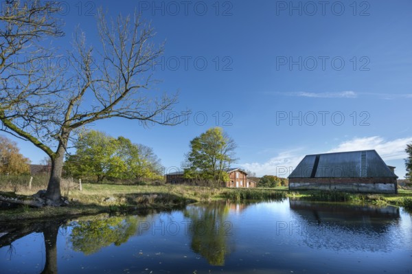 Othenstorf estate with pond and pig and poultry shed, built around 1900, Othenstorf, Mecklenburg-Western Pomerania, Germany, Europe