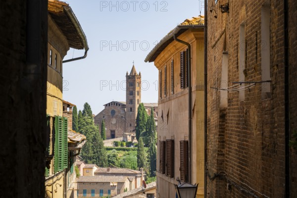 Old town with view of Basilica di San Clemente, historical, building, alley, Siena, Tuscany, Italy, Europe
