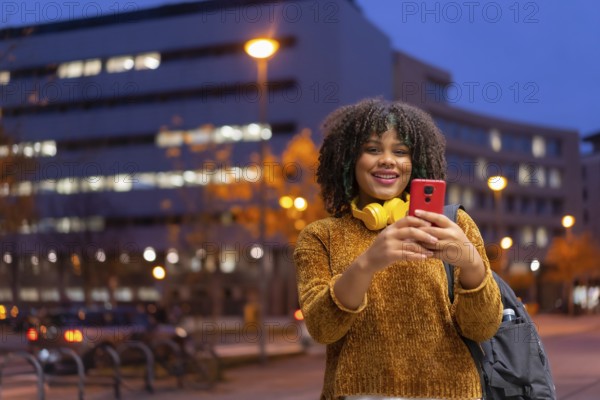 Portrait of black ethnic girl in the early morning going to the university on the way back to school