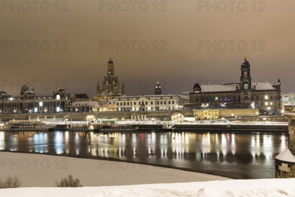 Old town across the Elbe at night and snow with the Academy of Fine Arts, Frauenkirche, secondary school, town hall tower and Ständehaus, Dresden, Saxony, Germany, Europe