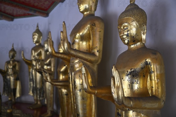 Gilded Buddha statues in Wat Pho, Temple of the Reclining Buddha, Bangkok, Thailand, Asia