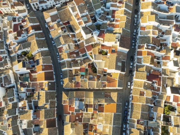Streets and rooftops in the White Town of Olvera. Aerial view. Drone shot. Cádiz province, Andalusia, Spain, Europe