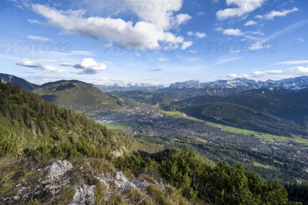 View of Garmisch-Partenkirchen and mountain panorama, hike to Kramerspitz, in autumn, Ammergau Alps, in autumn, Bavarian Alps, Bavaria, Germany, Europe