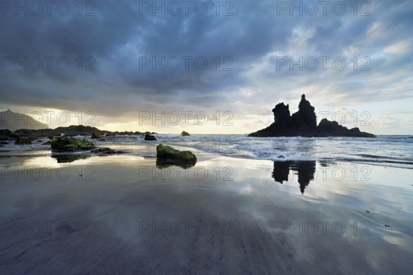 Dramatic clouds with rock formation on the beach of Playa de Benijo, Tenerife, Canary Island, Spain, Europe