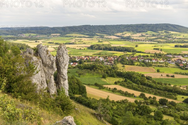 Wiesenthauer Nadel rock formation on the Walberla, view of Schlaifhausen, Ehrenbürg, Bavaria, Germany, Europe