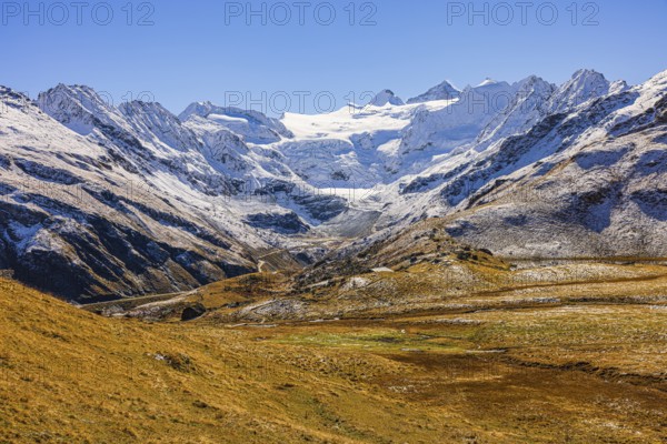 Alpine meadows covered in light snow, with the Moiry glacier in the background, near Grimentz, Val d'Anniviers, Valais Alps, Canton Valais, Switzerland, Europe