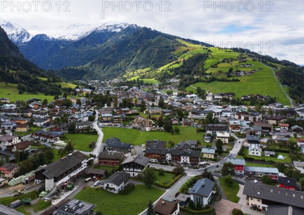 Drone image, residential buildings, view of village with parish church, Kaprun, Pinzgau, Salzburg province, Austria, Europe