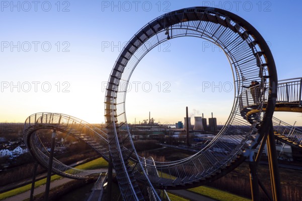 Tiger and Turtle, Magic Mountain is a landmark modelled on a roller coaster, the large sculpture is a walk-in work of art by Heike Mutter and Ulrich Genth, which was developed as part of the Ruhr.2010 Capital of Culture, behind HKM Hüttenwerke Krupp Mannesmann and RWE Power AG, Duisburg, Ruhr area, North Rhine-Westphalia, Germany, Europe