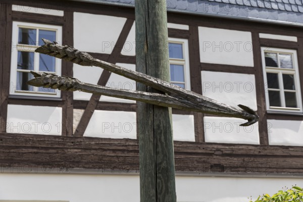 Large wooden arrow as a signpost in Mülsen, Zwickau district, Saxony, Germany, Europe
