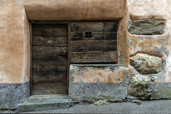 Door and window closed with thick boards, Prato, Lavizzara, Canton Ticino, Switzerland, Europe