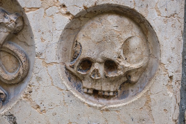 Relief of a skull on an epitaph, Church of Our Lady, or Cathedral of Our Lady, in Munich, Bavaria, Germany, Europe