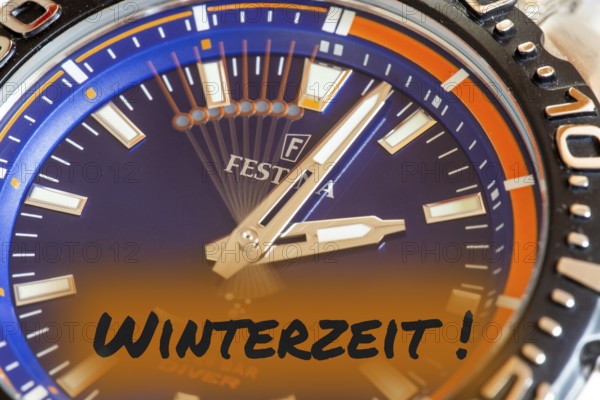 Symbolic image time change, winter time: close-up of a wristwatch with the inscription WINTER TIME