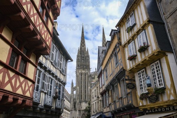Quimper, Brittany, France - Quimper, Kemper in Breton, is the capital of the historic Cornouaille region in Brittany and the seat of the prefecture of the Département Finistère. Old town with half-timbered houses and the Saint-Corentin cathedral at the back