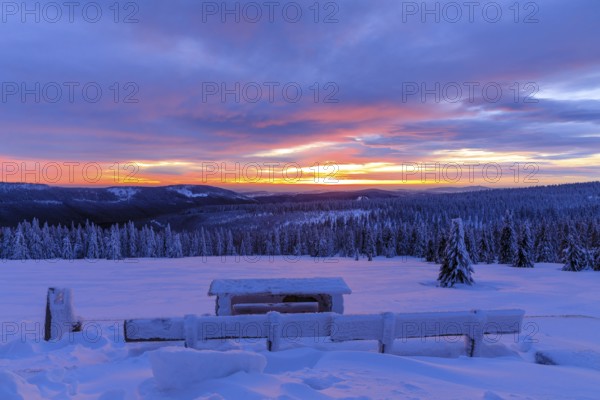 Colourful sunset in winter, view from the Wossecker Baude above Harrachsdorf in the Giant Mountains, Czech Republic, Europe