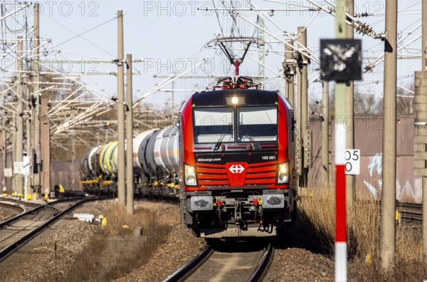 Goods train with Swiss locomotive passing through Baden-Baden station on the Rhine Valley line. SBB Cargo is a brand of the Swiss Federal Railways for freight transport. Baden-Baden, Baden-Württemberg, Germany, Europe