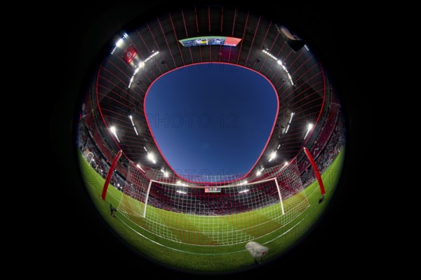 Overview, interior, floodlit match, behind-the-goal perspective, goal net, blue hour, fisheye shot, Champions League, Allianz Arena, Munich, Bavaria, Germany, Europe