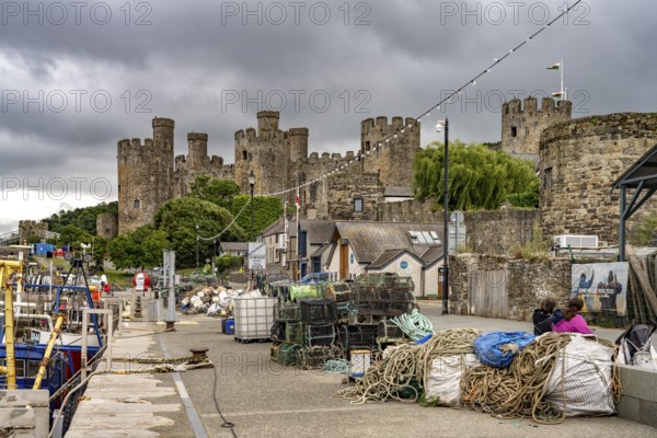 At the fishermen's quay and Conwy Castle in Conwy, Wales, Great Britain