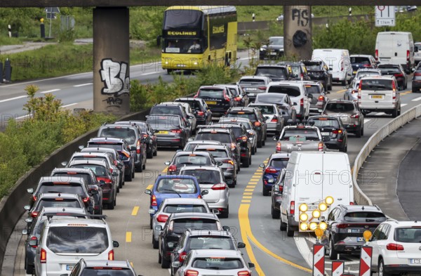 Duisburg, North Rhine-Westphalia, Germany, traffic jam on the A40 motorway at the Kaiserberg junction. The busy area with the A40 and A3 motorways has been undergoing renovation and expansion for years. There are always closures or restrictions for motorists there, Europe