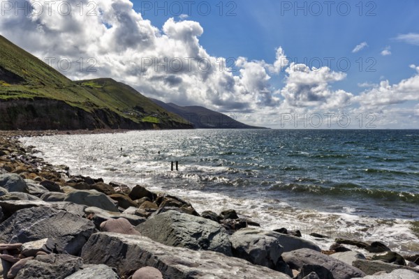 Coastline, rocky coast, Rossbeigh beach on the Atlantic coast, spring clouds, panoramic road Ring of Kerry, Iveragh peninsula, Wild Atlantic Way, Ireland, Europe