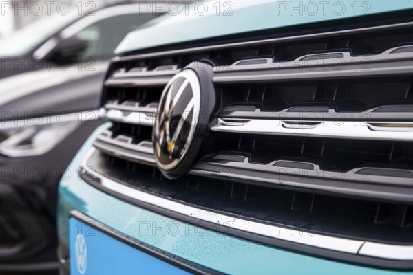 Close-up of vehicles from the car manufacturer VW in a car dealership