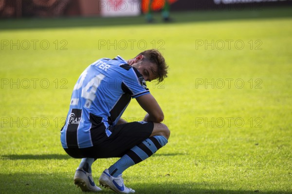 Football 3rd division, season 2024/25, matchday 4: Waldhof Mannheim against 1. FC Saarbrücken. Picture: Lukas Klünter (24, Mannheim) exhausted and sad after the 1-0 defeat