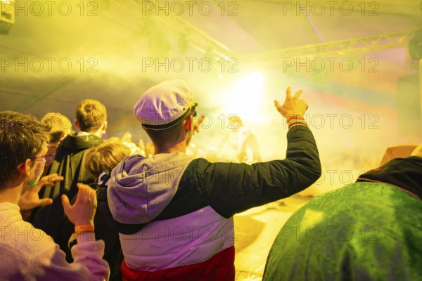 Audience enjoys a brightly lit show at an event, the atmosphere is lively and festive, carnival, Schlagerkuchen Donzdorf, district of Göppingen, Germany, Europe