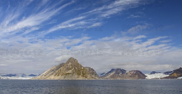 Luciapynten, mountain with steep sea cliffs in Hornsund fjord in summer, Svalbard, Spitsbergen, Norway, Europe