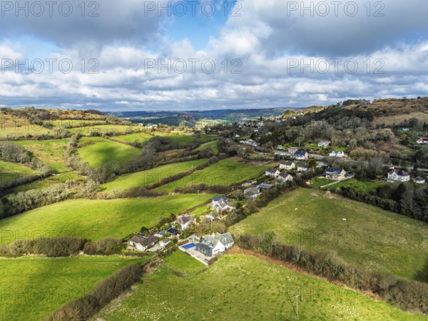 Farms over Morcombelake Village from a drone, Bridport, Dorset, England, United Kingdom, Europe