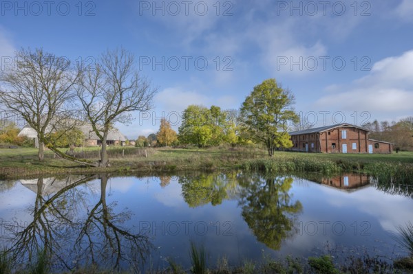 Othenstorf estate with pond and historic pigsty, built around 1900, barn on the left, Othenstorf, Mecklenburg-Vorpommern, Germany, Europe