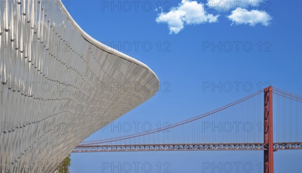 Lisbon, Landmark suspension 25 of April bridge over Tagus reiver near Belem tower