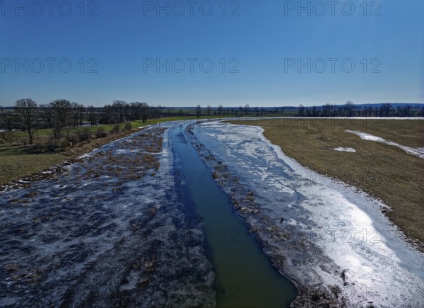 Icy drainage ditch in the landscape of the Havel floodplain in the Altmark. Aerial view. Havelberg, Saxony-Anhalt, Germany, Europe