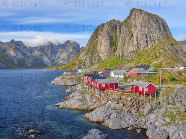 Rorbuer in Hamnoy, Mount Olstinden, blue sky, Moskenesoya, Lofoten, Norway, Europe