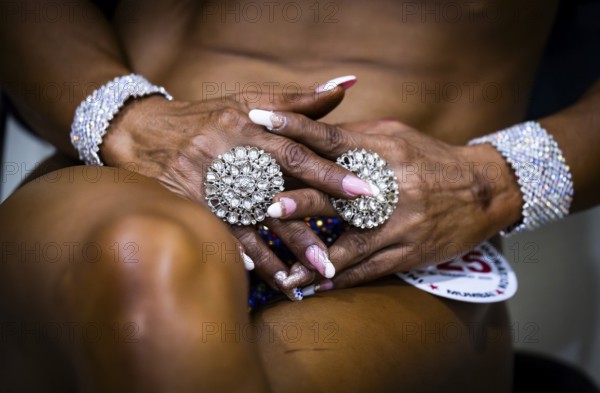 Female participants gets ready backstage as they prepare for the 4th Ms Saraighat all India classic body building championship on March 23, 2025 in Guwahati, India, Asia