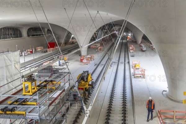 The last rails are being welded at the new main station. All the rails are now in place between Feuerbach and Wendlingen. The last gaps between the rails have been closed using the Thermit welding process. The infrastructure project is scheduled to go online at the end of 2026. Deutsche Bahn estimates the total cost of Stuttgart 21 at around eleven billion euros. Stuttgart, Baden-Württemberg, Germany, Europe