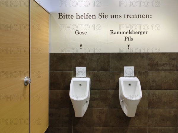 Two urinals with the witty request Please help us separate, Gose on the left, Rammelsberger Pils on the right, Goslar, Lower Saxony, Germany, Europe