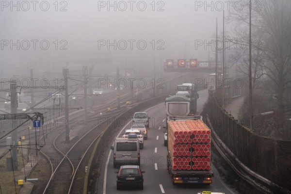 Dense fog, with visibility sometimes less than 100 metres, A40 motorway, city passage in Essen, North Rhine-Westphalia, Germany, Europe