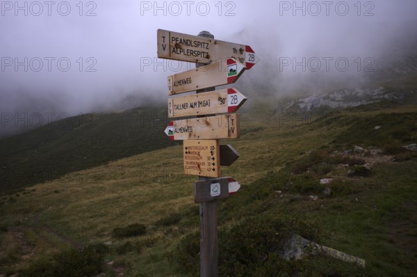 Signpost, Almenweg, Klammeben, Hirzer near Saltaus, Schenna, Scena, Passeier Valley, fog, South Tyrol, Autonomous Province of Bolzano, Italy, Europe