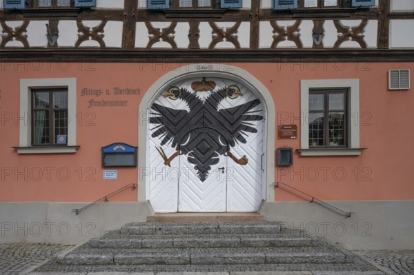 Double eagle on the entrance gate of today's Gasthof Obleyhof, 1385 to 1803 Spitalhof and then brewery until 1948, Baunach, Upper Franconia, Bavaria, Germany, Europe