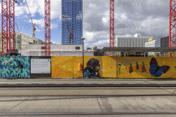 Construction site, construction fence and crane at Alexanderplatz in Berlin, Germany, Europe